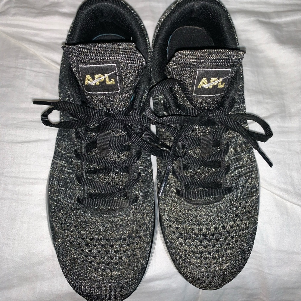 APL tennis shoes size 8